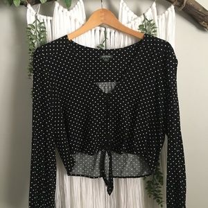 Black and white polka dotted front tie blouse